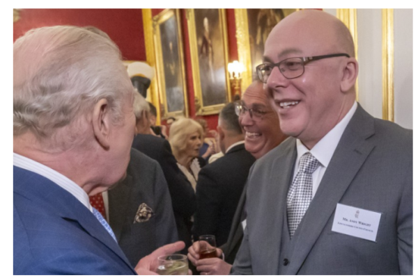 Council duo honoured at royal reception