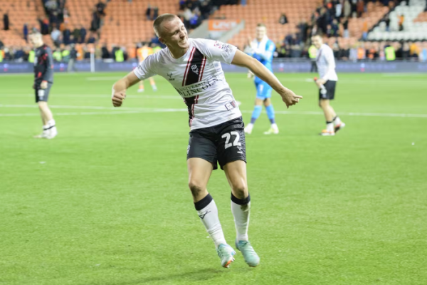 Defender Tom commits to Imps